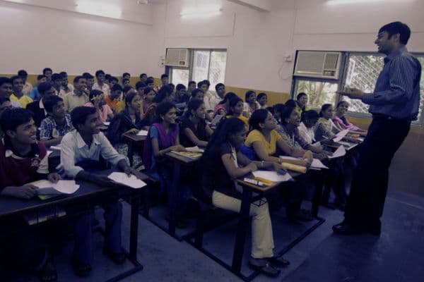 Students learning in global classroom